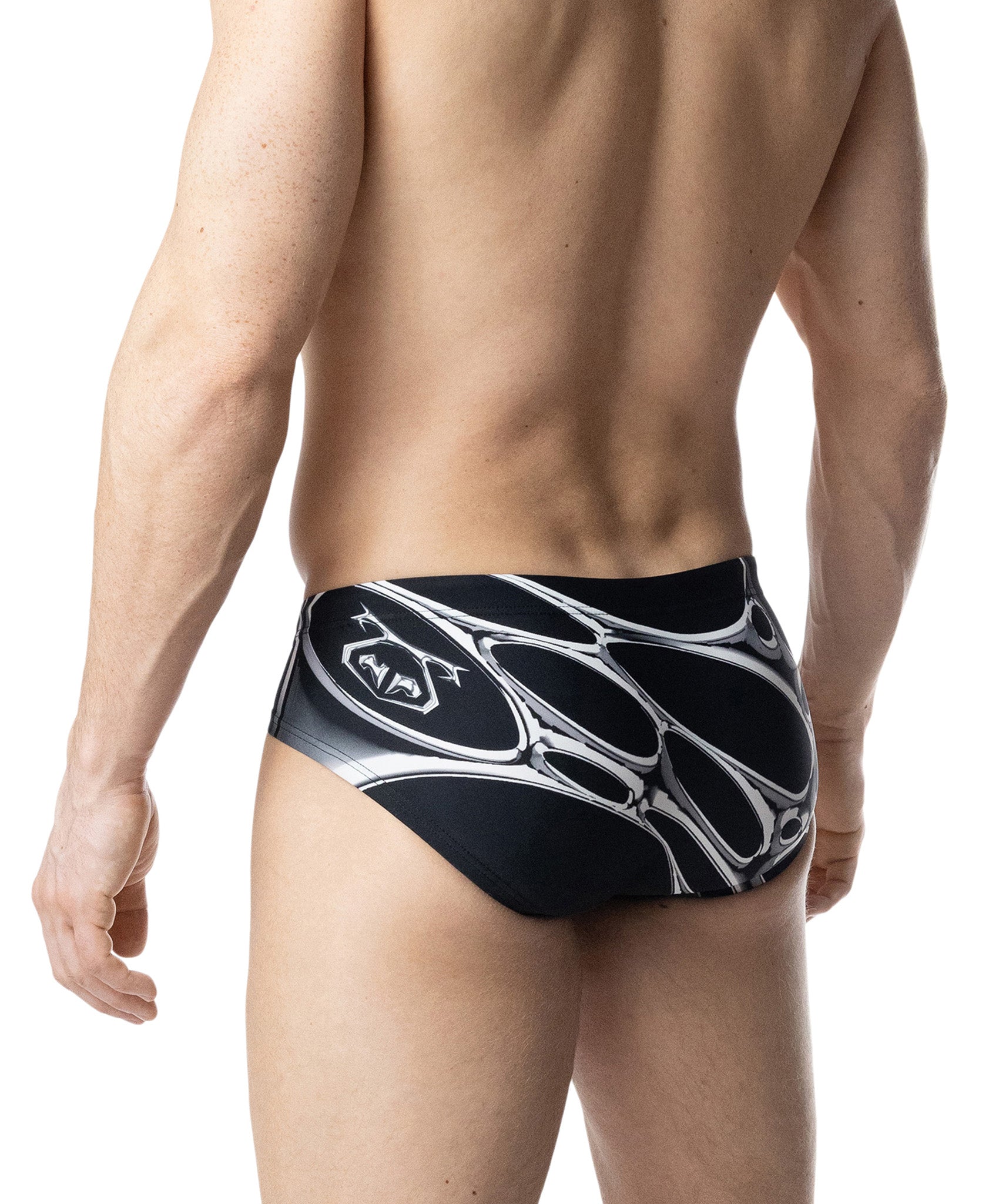 Black swim brief with white design on a white background