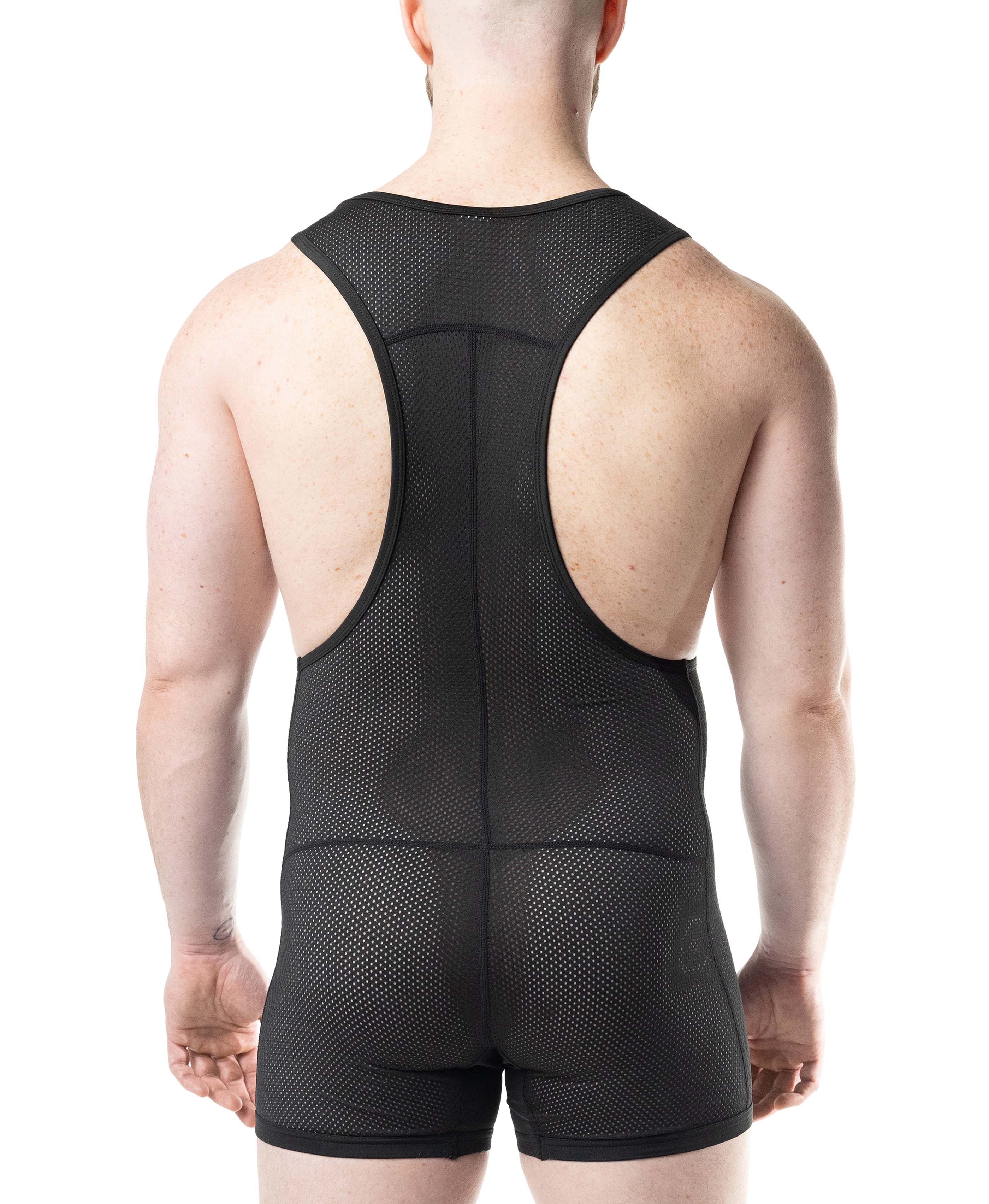 Person wearing a black compression garment on a white background