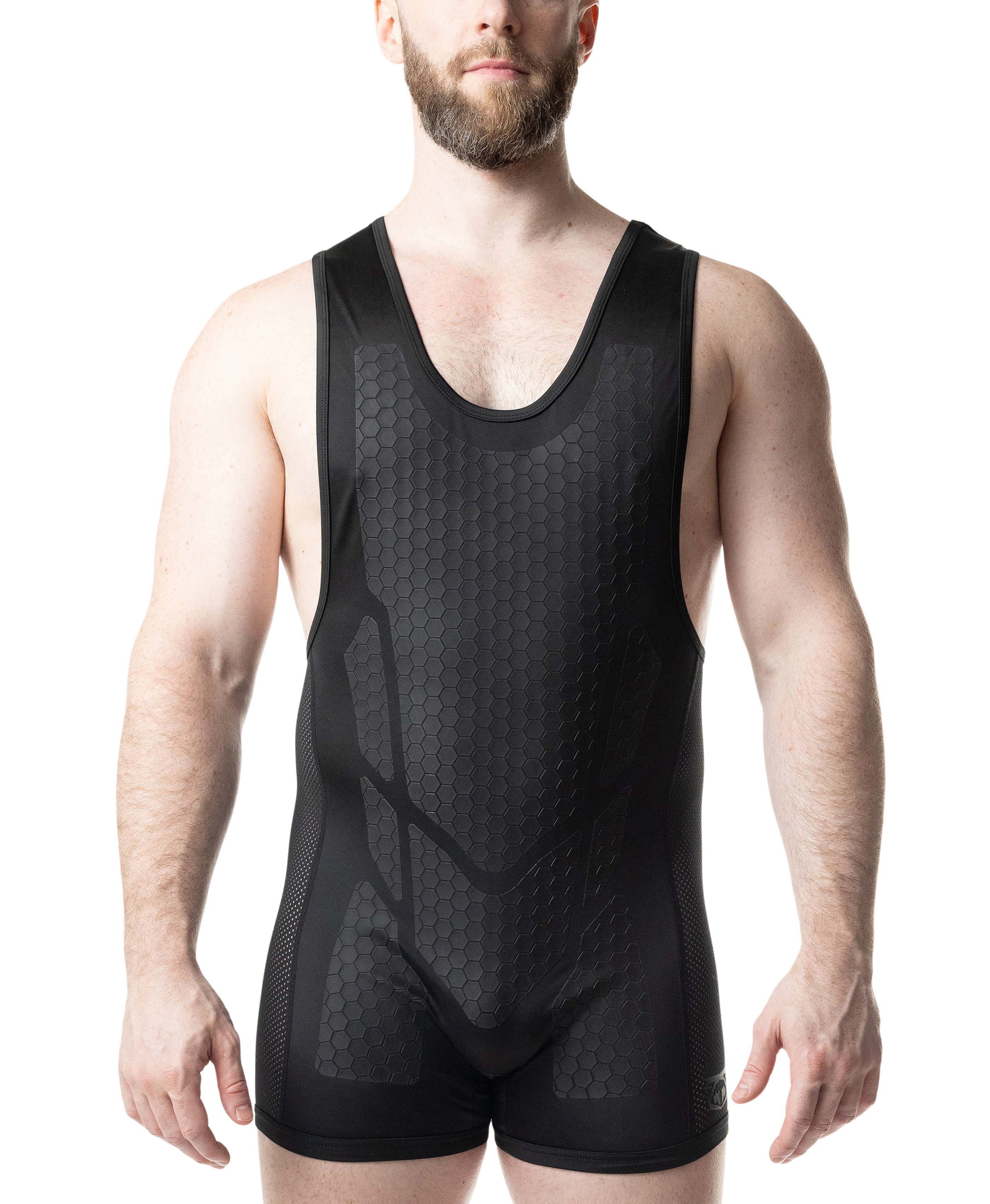 Man wearing a black compression garment on a white background