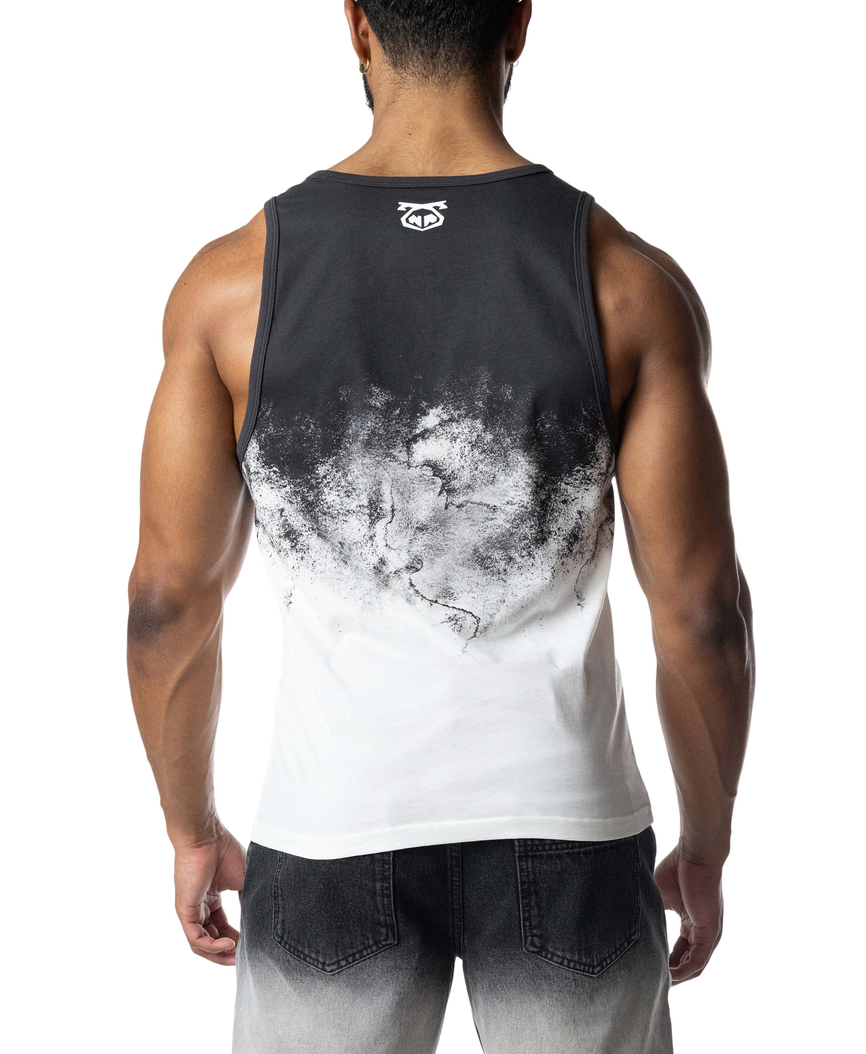 Person wearing a black and white tank top with a gradient design on a white background
