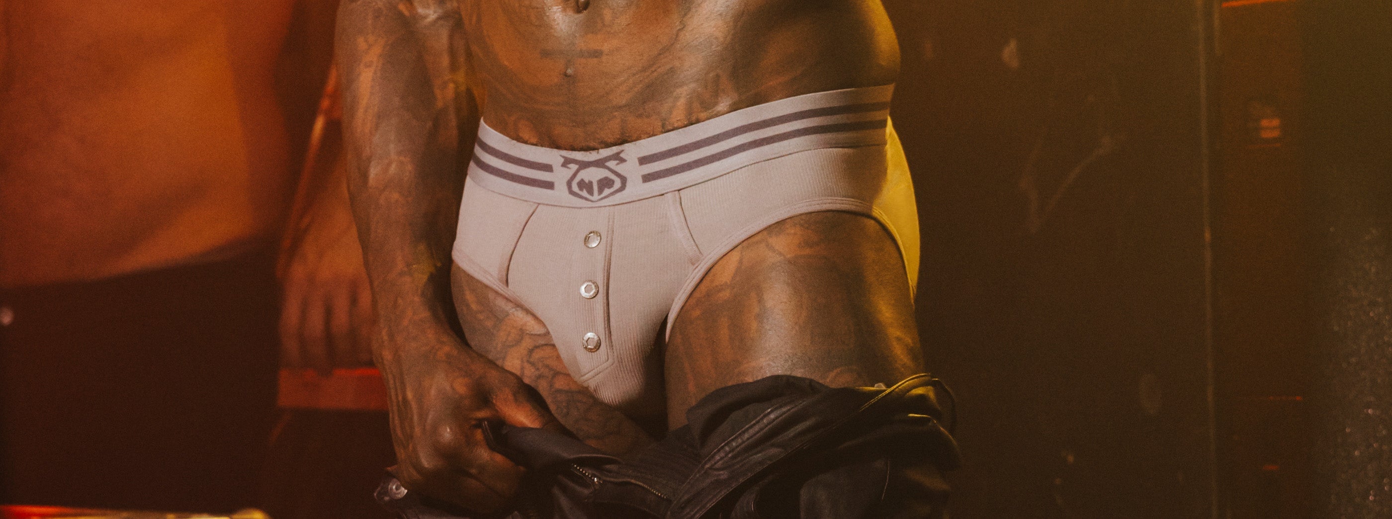 Man posing in boxer briefs