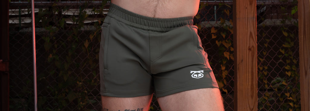 Man wearing Army Green Youtility Rugby Short from Nasty Pig