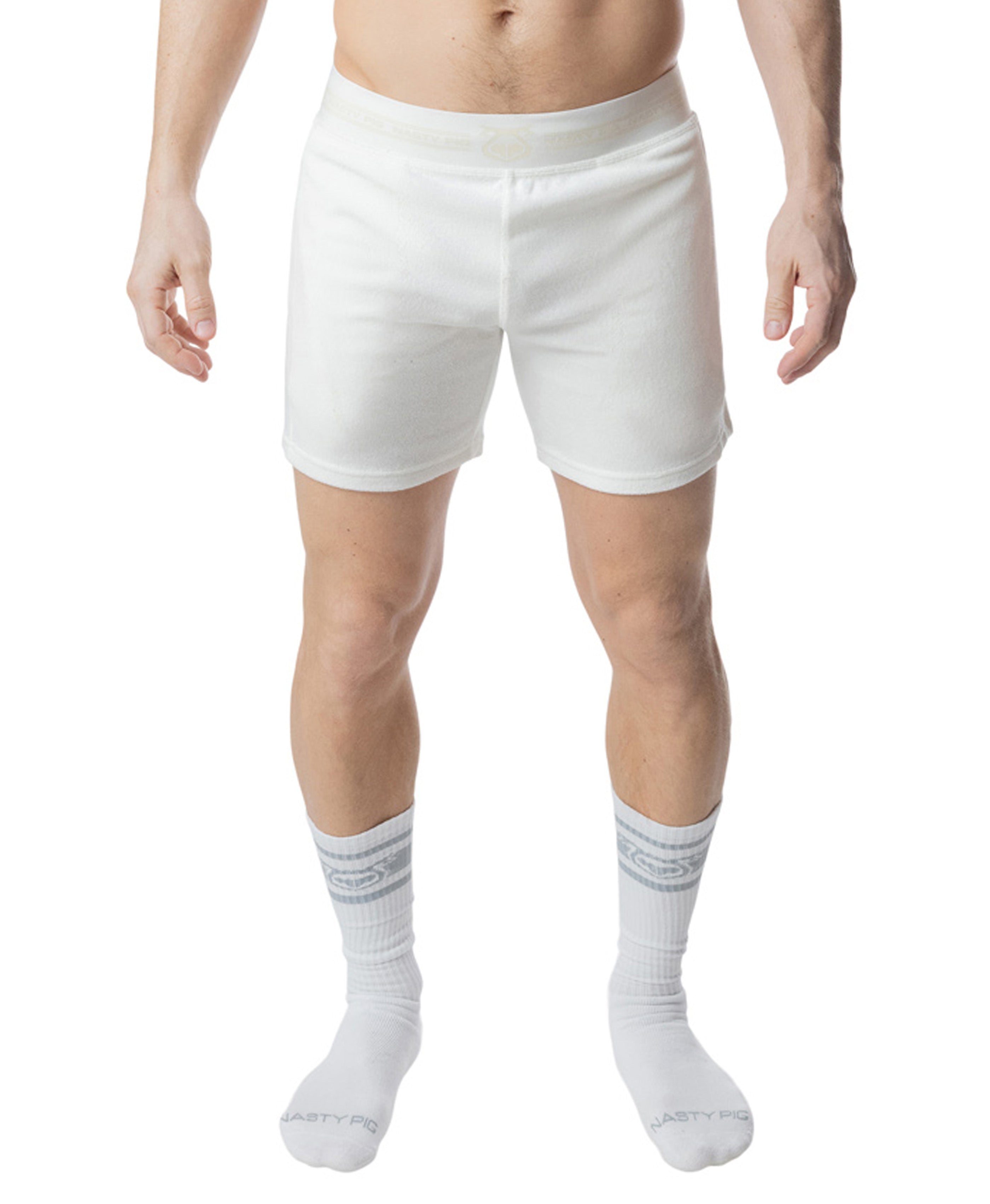 Person wearing white shorts and socks on a white background